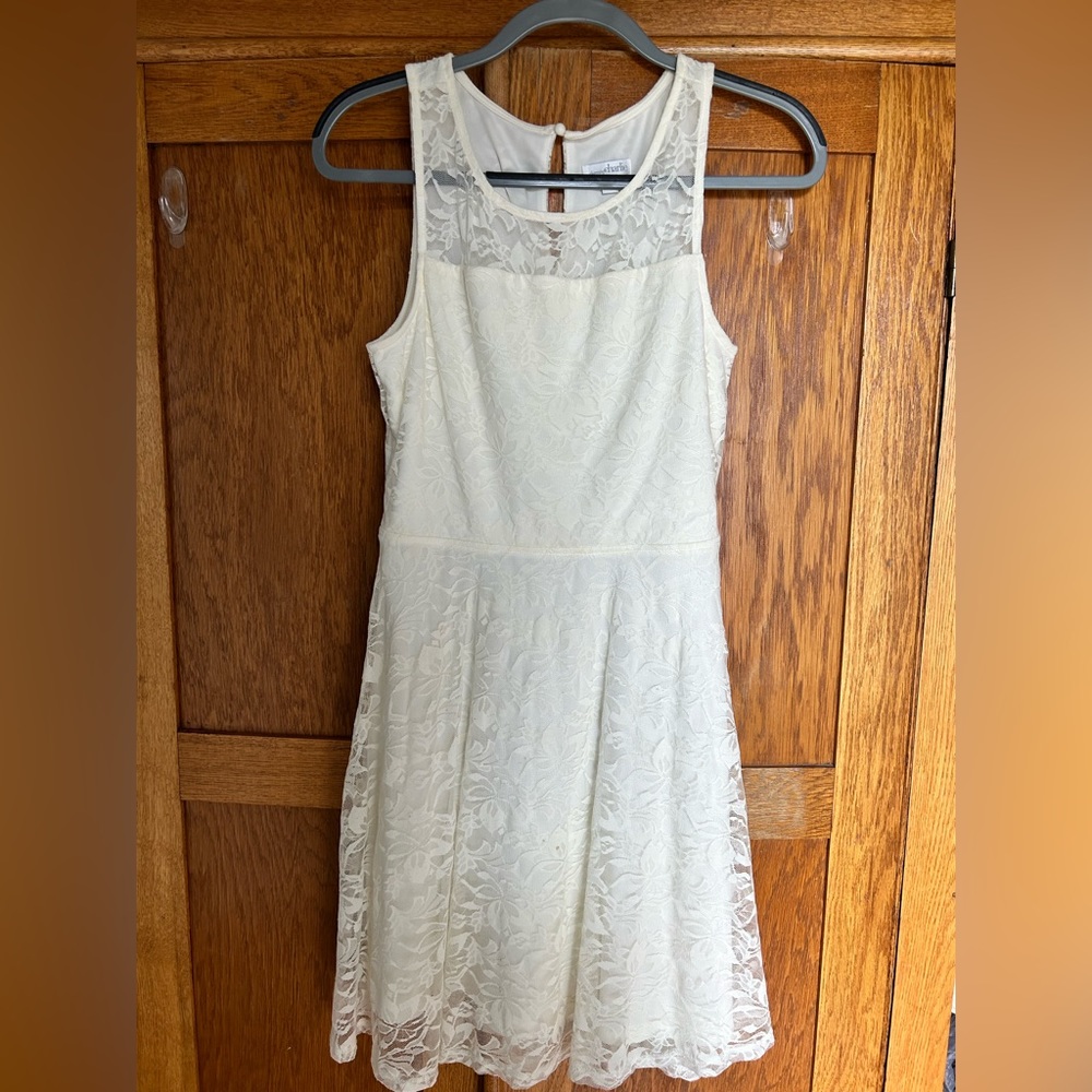 Charming Charlie short lace dress. Sleeveless. Size M back keyhole closure